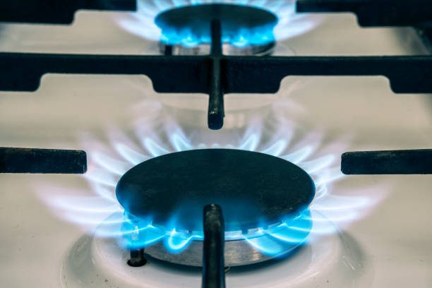 istock Gas stove flame on kitchen. Blue fire flame from stove. 941040484