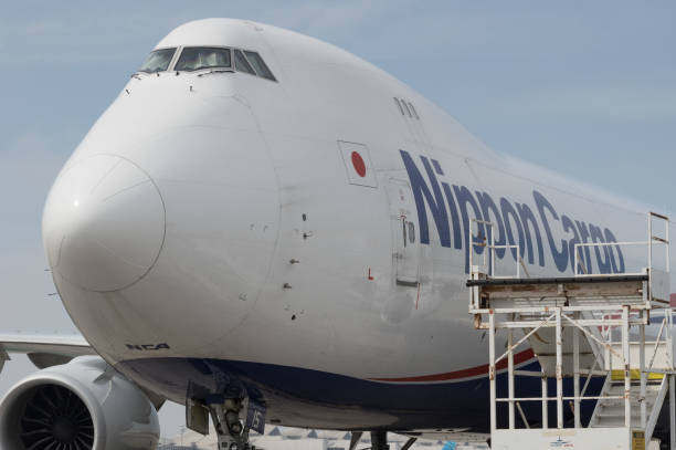 Nippon Cargo Airlines Boeing 747 parked. Nippon Cargo Airlines, NCA, Boeing 747 shown parked at the Los Angeles International Airport. nippon cargo airlines photos stock pictures, royalty-free photos & images