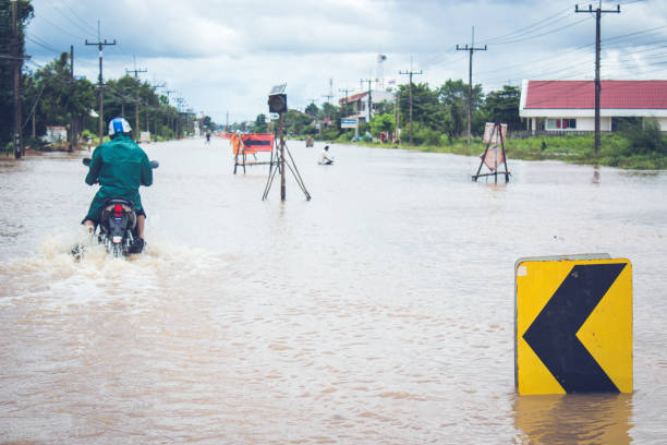 istock Road closed because of flooding 941044448