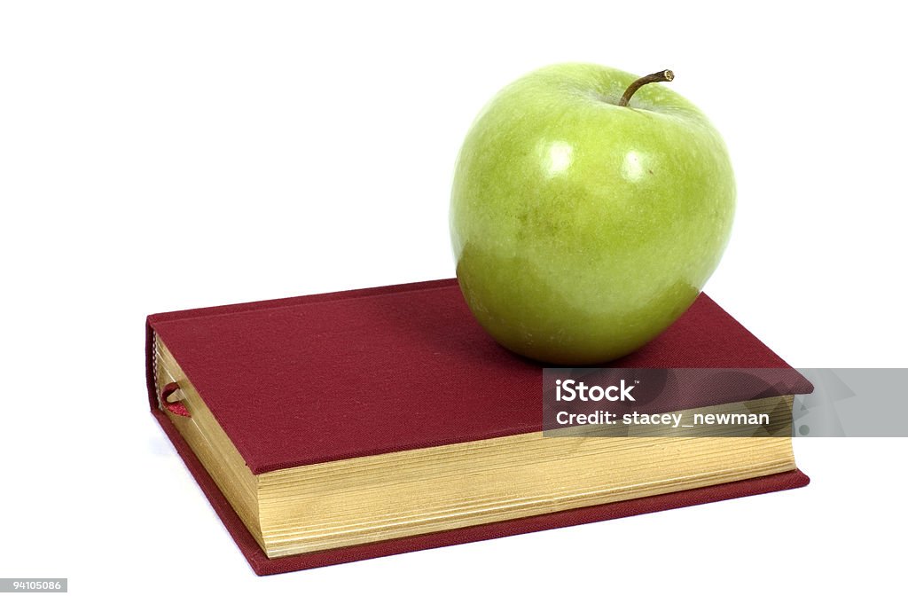Zielone Jabłko na książki - Zbiór zdjęć royalty-free (Bez ludzi)