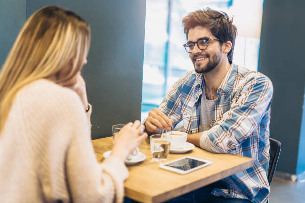 istock Couple in cafe enjoying the time spending with each other 941051192