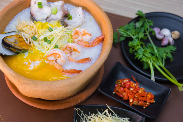 istock seafood rice soup in Pottery 941051250