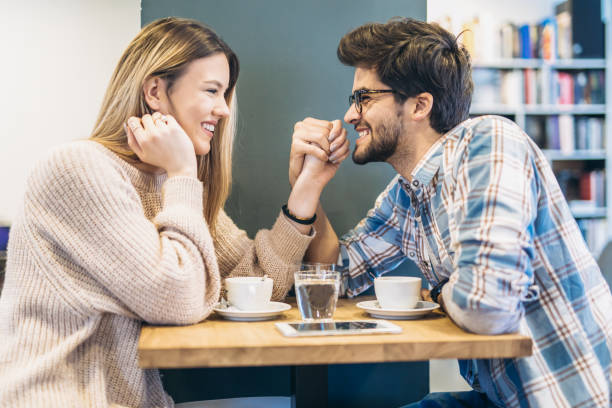 istock Couple in cafe enjoying the time spending with each other 941051334