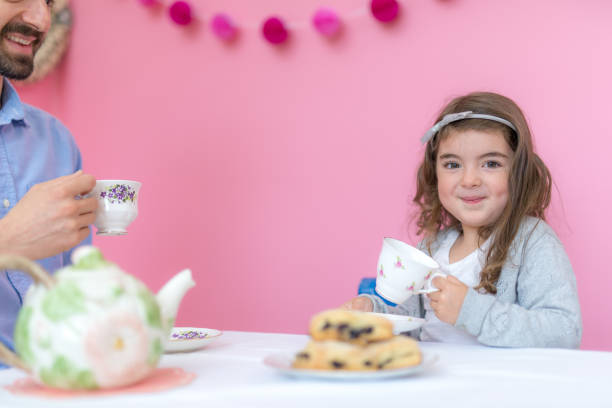 istock Father-daughter tea party 941055820