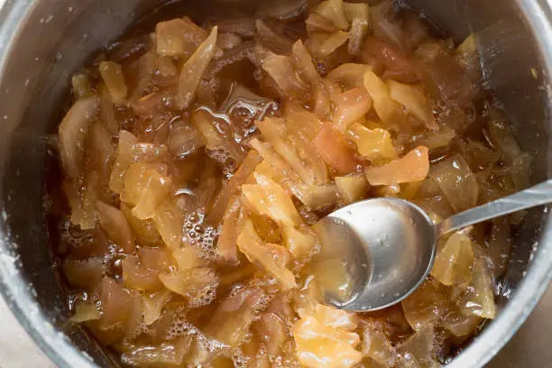 Photo of Cooked pear jam in pan