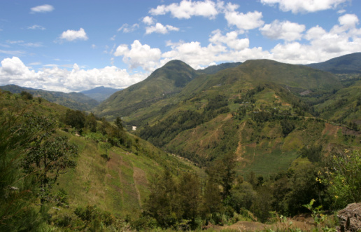 Mountainous Andean scenery in Santander, Colombia, under the morning sunlight.