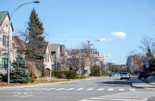 istock Construction, modern condo buildings and houses 941065574