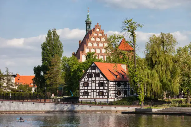 City of Bydgoszcz in Poland, White Granary on Mill Island and Cathedral, river Brda waterfront.