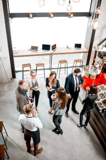 istock Business people in the cafe 941071500