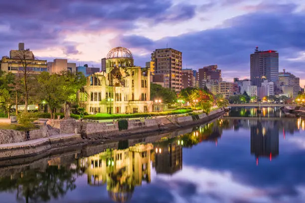 Hiroshima, Japan city skyline at dusk with the Atomic dome.