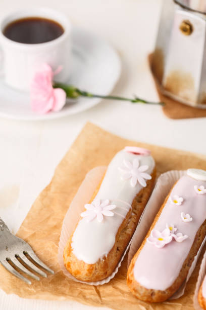 istock Traditional French eclairs with coffee. Good Breakfast 941076488
