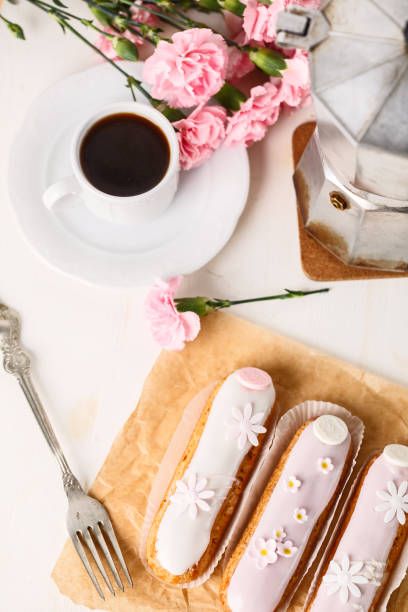 istock Traditional French eclairs with coffee. Good Breakfast 941076650