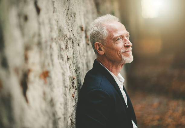 Portrait of handsome mature man, light effect