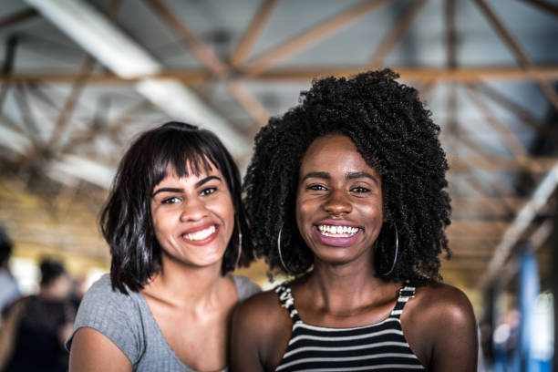 istock Two friends portrait at subway station 941081864