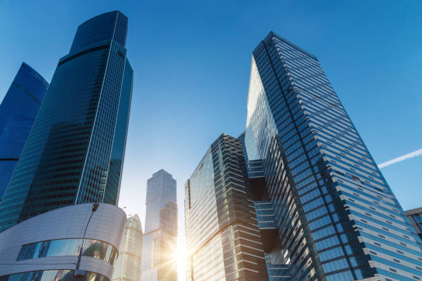 istock Modern skyscrapers in business district at sunset 941084988