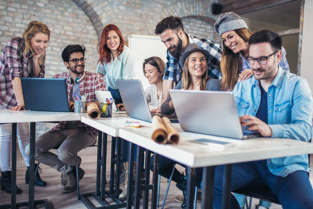 istock Business people working in office together. Team work in office. 941085130