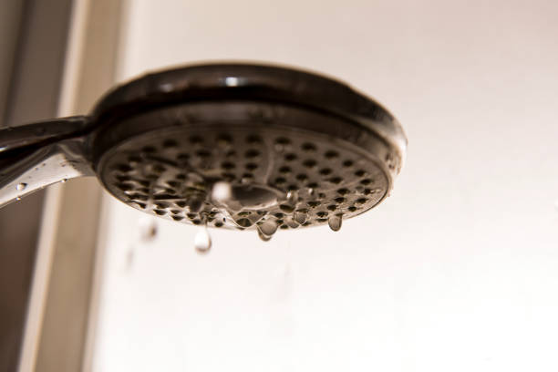 istock Water drops out of the showerhead 941085468
