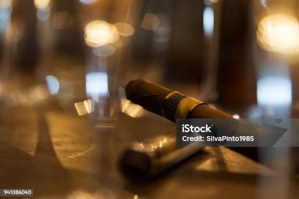 Close Up Of Cigars On Bar Table With Blurred Background Stock Photo - Download Image Now