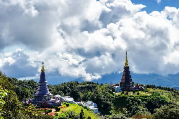 Photo of Sunrise scence of two pagoda on the top of Inthanon mountain in doi Inthanon national park, Chiang Mai, Thailand.