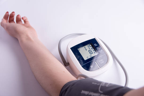 istock measuring blood pressure on a white background 941086508