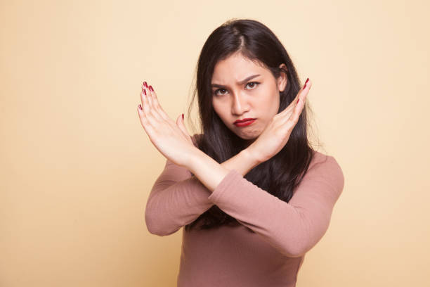istock Beautiful young Asian woman say no. 941094496