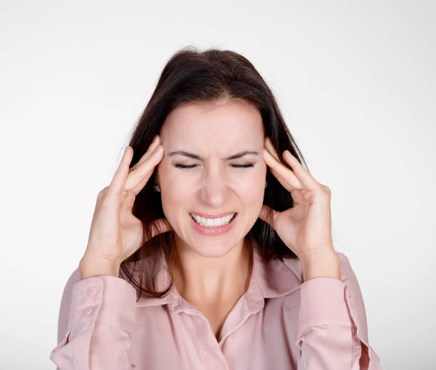 istock businesswoman has headache 941099946