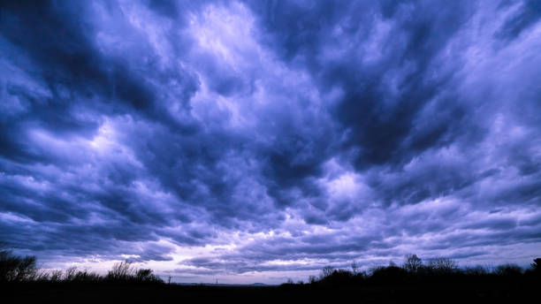 istock Landscape background of dark cloudy sky before a thunder-storm. 941100592