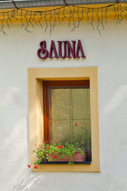 istock Sauna sign outdoor on building 941107264