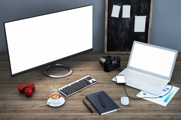 istock Home office desk with computer monitor and laptop 941108618