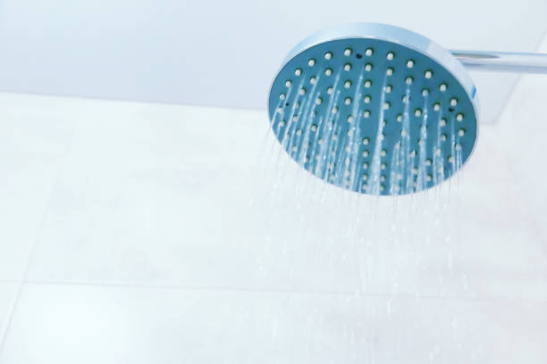 istock Close up of shower head in the bathroom 941109280