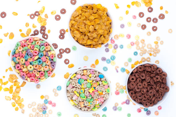 istock Four bowls of cereals on white background 941113194