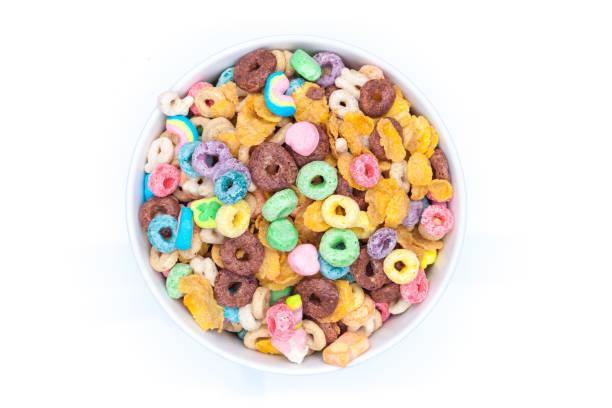 istock Isolated bowl of mixed cereals and marshmallows on white background 941113244