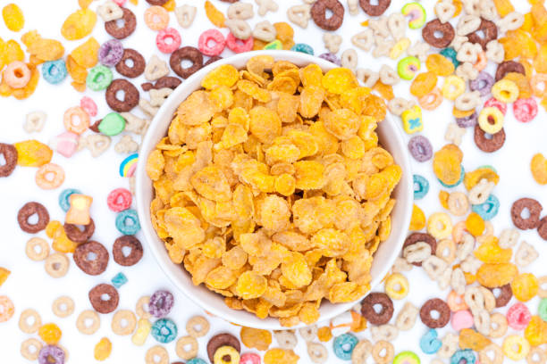 istock Bowl of corn flex cereals on white background 941115426