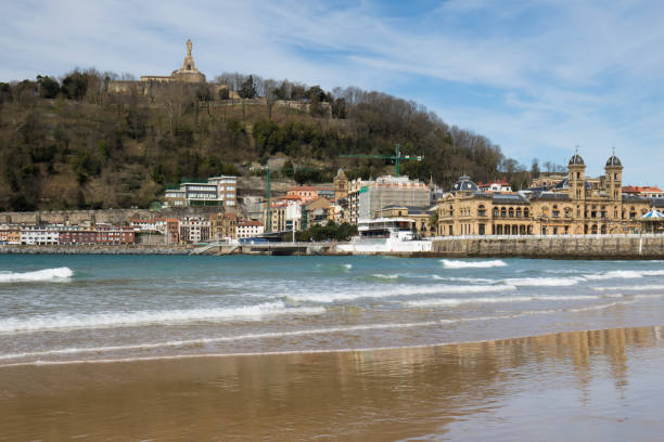 istock beautiful sandy beach in san sebastian with monte urgull, spain 941116500
