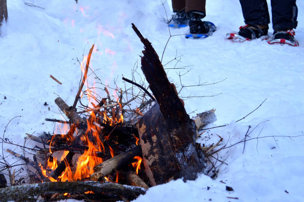 istock Campfire outside in winter time during snowshoes hiking 941122168