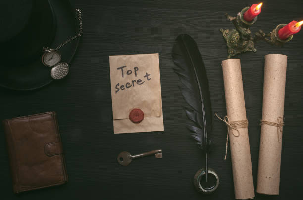 istock Top secret message document. Forbidden information. Detective agent desk table concept background. 941128140