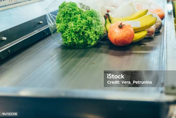 Products On The Cash Desk Grocery Shopping Stock Photo - Download Image Now - Supermarket, Checkout, Groceries