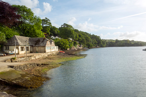 A peaceful summer morning on the Helford Estuary at old fashioned Port Navas, Cornwall, UK