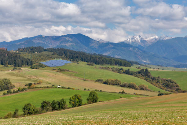 istock Summer hills landscape with solar panels in Slovakia. 941136228