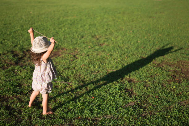 Little girls playing on the lawn