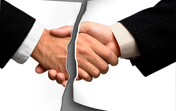 Broken business handshake  cancellation stock pictures, royalty-free photos & images