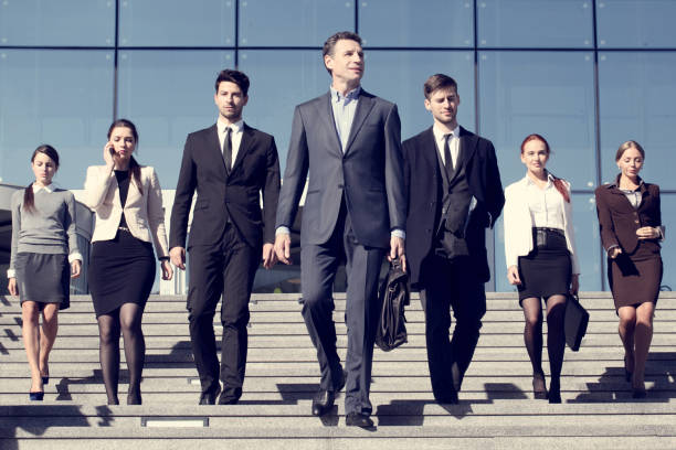 istock Business people at stairs 941140174