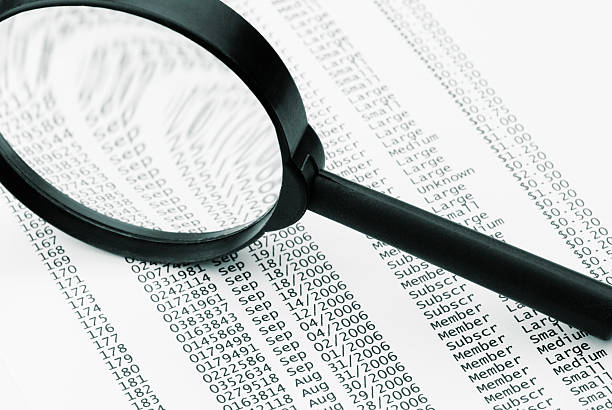 istock magnifying glass and business data 94114060