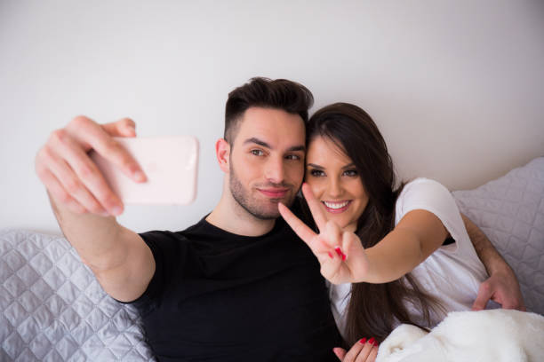 istock a loving couple at home 941147866