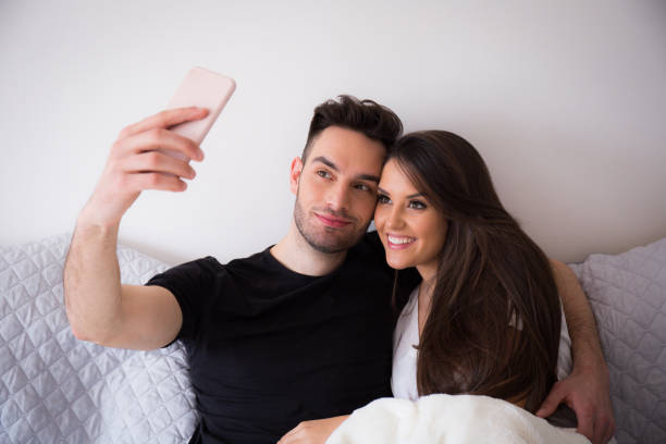 istock a loving couple at home 941148268