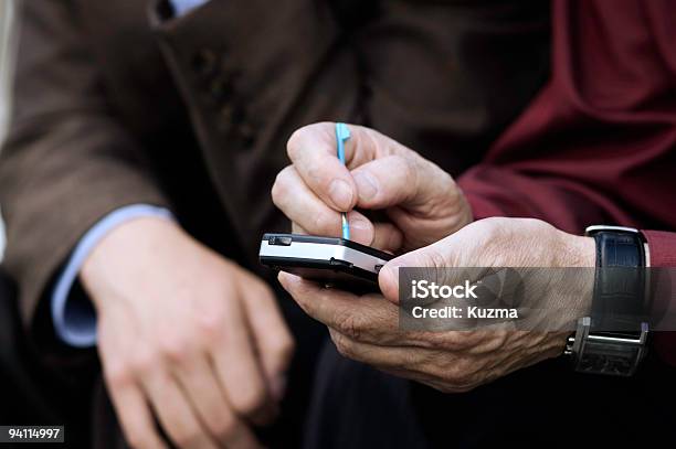 Pda Foto de stock y más banco de imágenes de Adulto - Adulto, Agarrar, Ayuda