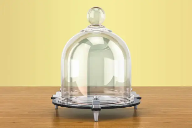 Glass Bell or Bell Jar on the wooden table. 3D rendering