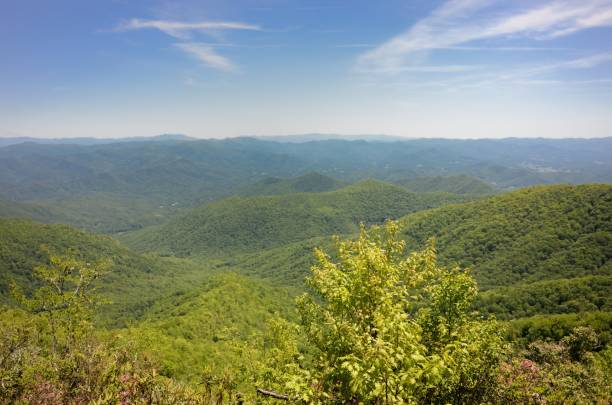 istock Scenic view of valley with rolling hills 941163090