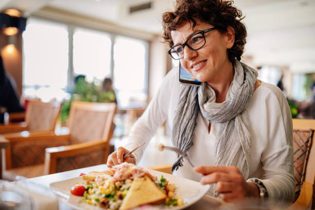 istock Woman at a restaurant 941163434