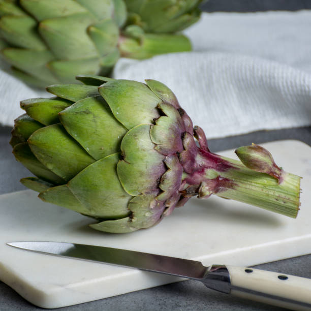 istock Green ripe raw artichokes ready to cook 941163480